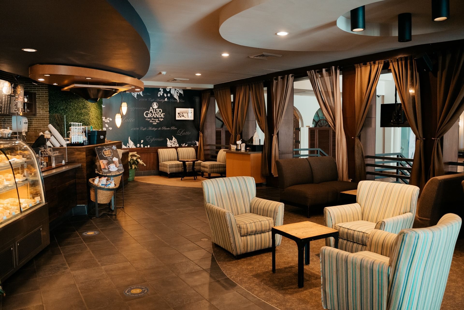 El Cafecito coffee counter and pastry display at El Conquistador