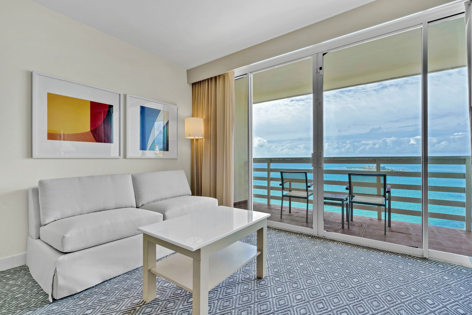 El Conquistador ocean-view room sitting area and balcony